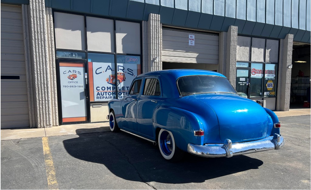 C.A.R.S. shop front with classic car