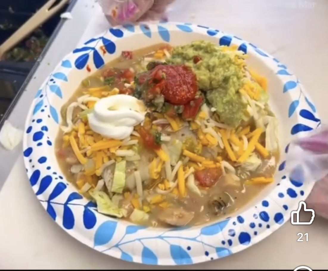 Smothered burrito and toppings from Paco's Tacos