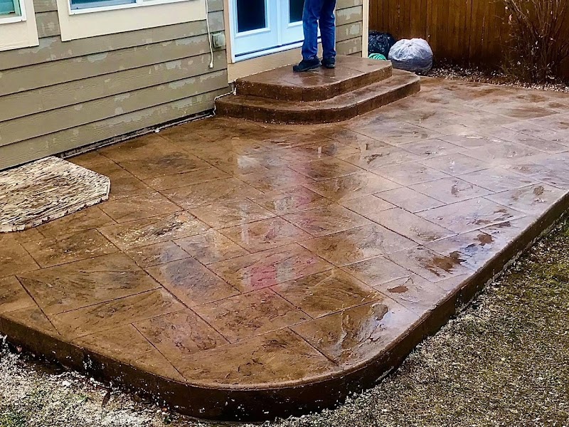 Patio after power washing by True Grit